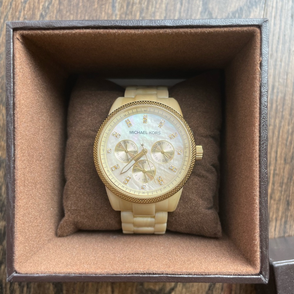Michael Kors Tan Horn jet set watch.